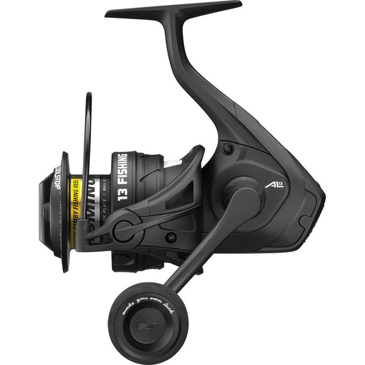 Black fishing reel with visible branding on a white background