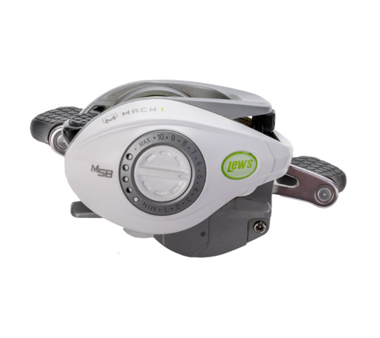 Fishing reel with white frame, black and green accents on a white background