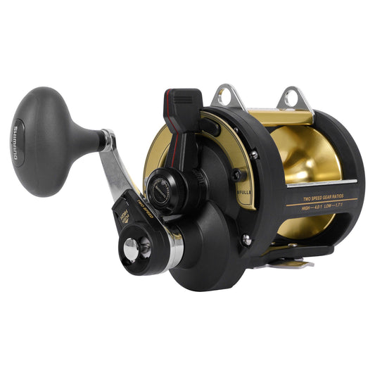 Fishing reel with black and gold design on a white background