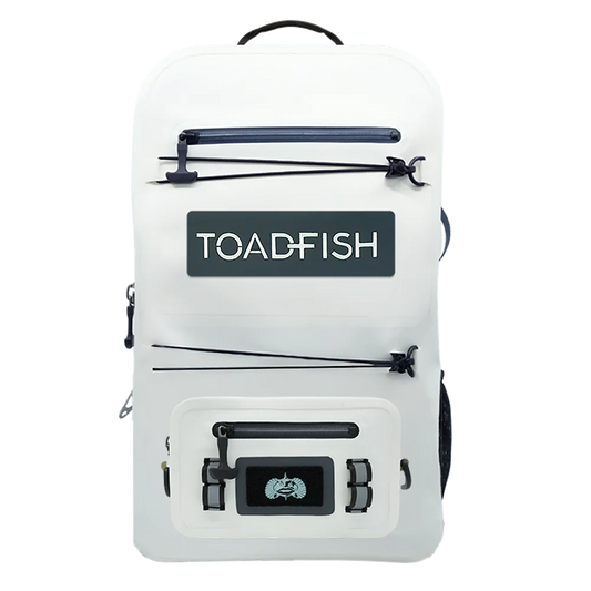 White backpack with black zippers and 'TOADFISH' logo on a white background