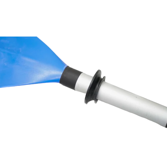 Close-up of a white and black object with a blue background