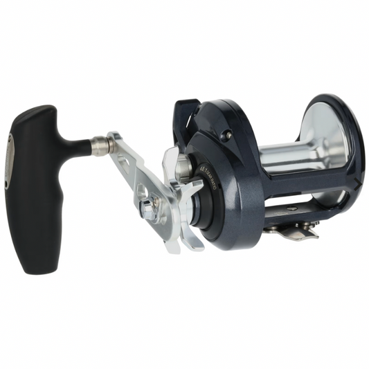 Fishing reel with black handle and silver metal components on a white background