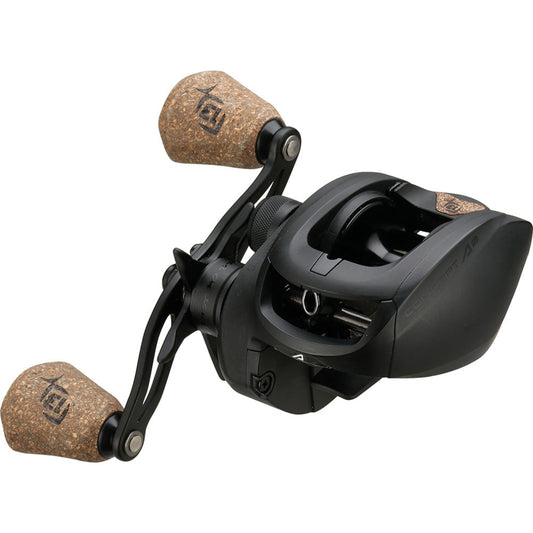 Black fishing reel with cork handles on a white background
