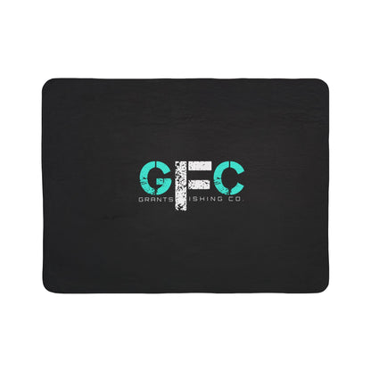Black mat with teal and white logo on a white background