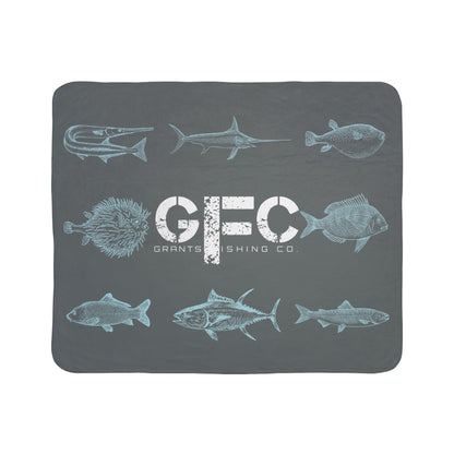 Gray blanket with fish illustrations and 'Grants Fishing Co' branding on a white background