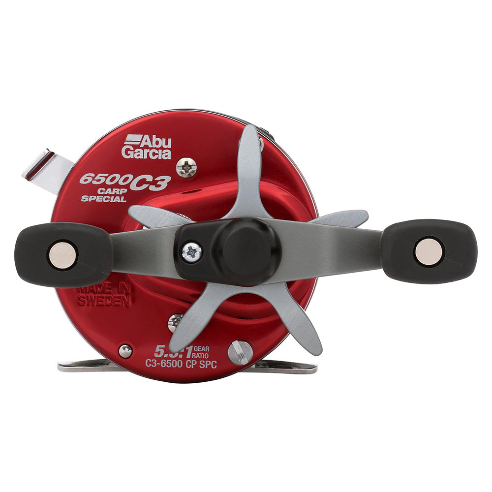 Red Abu Garcia fishing reel on a white background