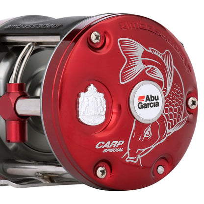 Red Abu Garcia carp fishing reel on a white background