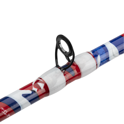 Close-up of a fishing rod with a colorful handle on a white background
