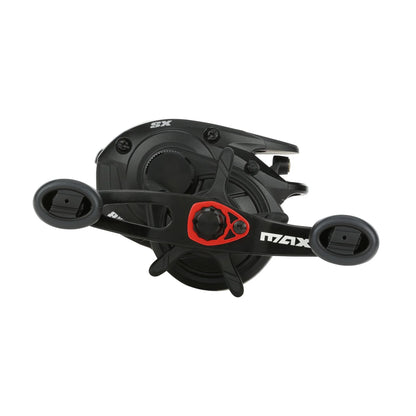 Black and red fishing reel on a white background