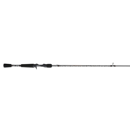 Fishing rod with black handle and silver rod on a white background