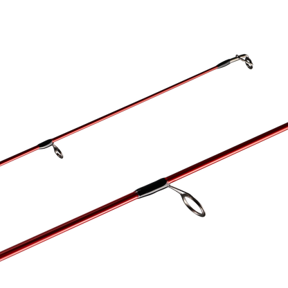 Fishing rod with cork handle and red tip on a white background