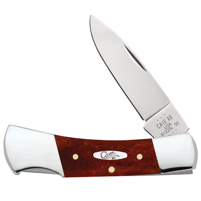 Pocket knife with wooden handle and metal blade on a white background