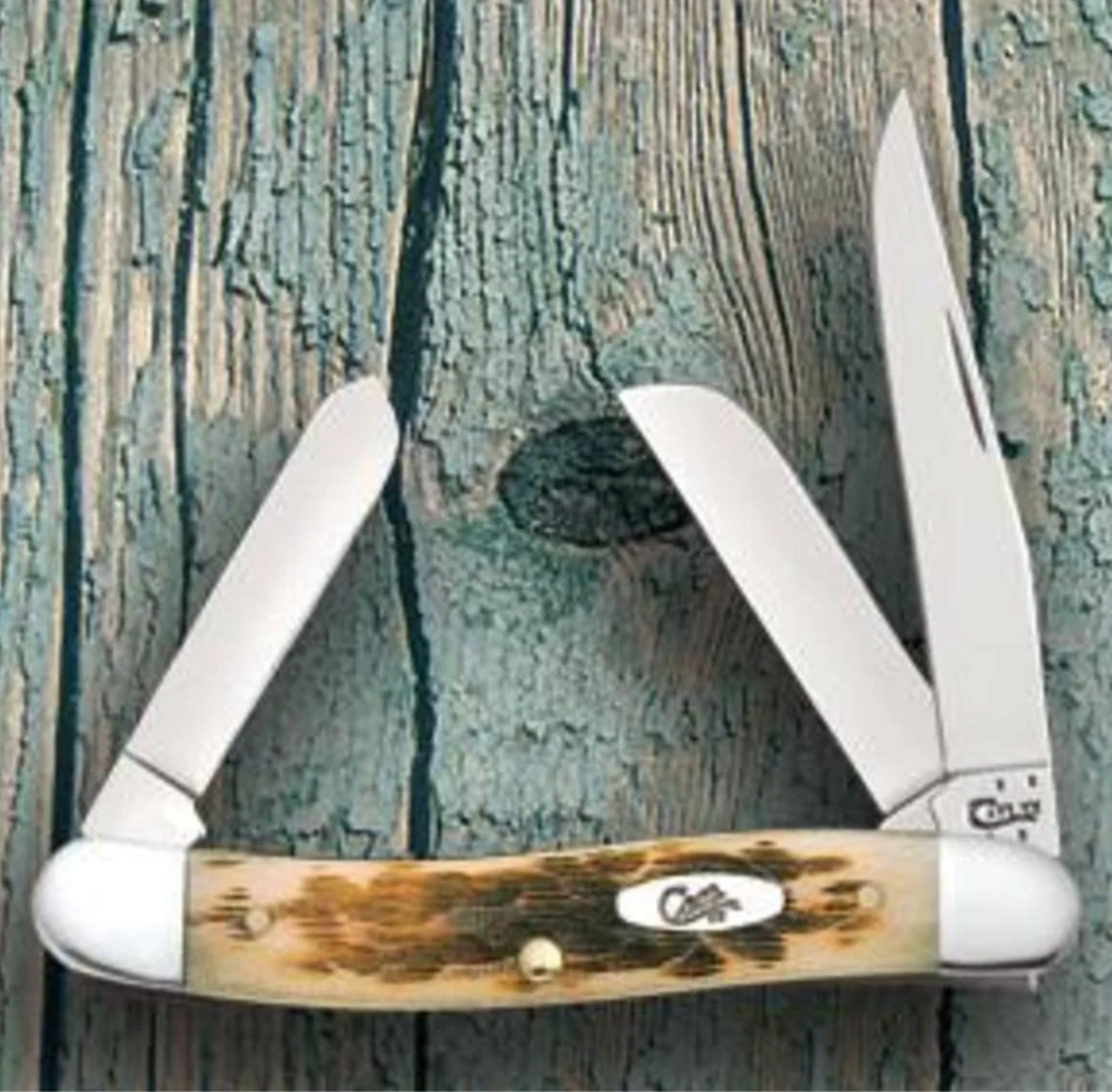 CASE STOCKMAN MEDIUM 3 BLADE 3 1/2" AMBER BONE