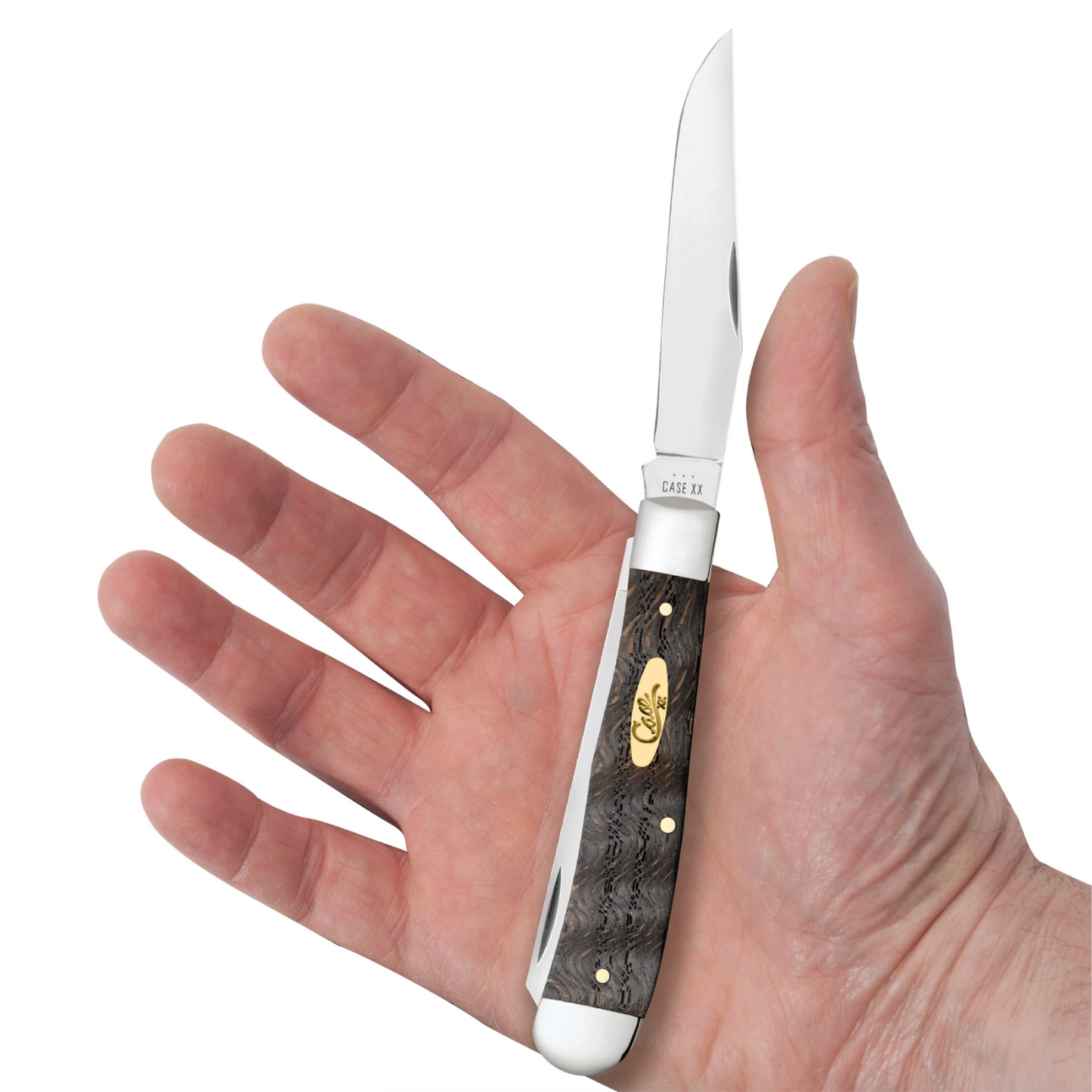 Hand holding a pocket knife with a wooden handle on a white background