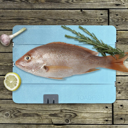 TOADFISH STOWAWAY FOLDING CUTTING BOARD W/BUILT-IN KNIFE SHARPENER - TEAL