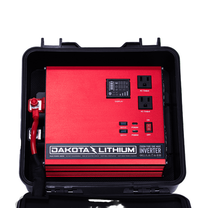 Dakota Lithium inverter with red front panel and black casing on a transparent background