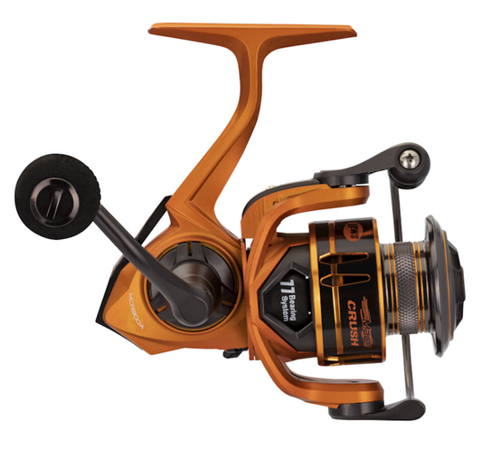 Fishing reel with wooden handle on a white background