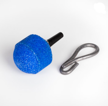 Blue foam ball with a black handle and metal clip on a white background
