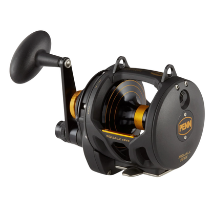 Fishing reel with black and gold design on a white background