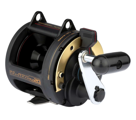 Fishing reel with black and gold design on a white background