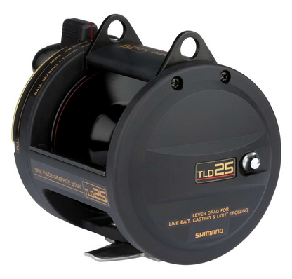 Shimano fishing reel with black and gold design on a white background