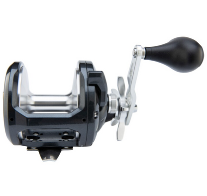 Fishing reel with black handle on a white background