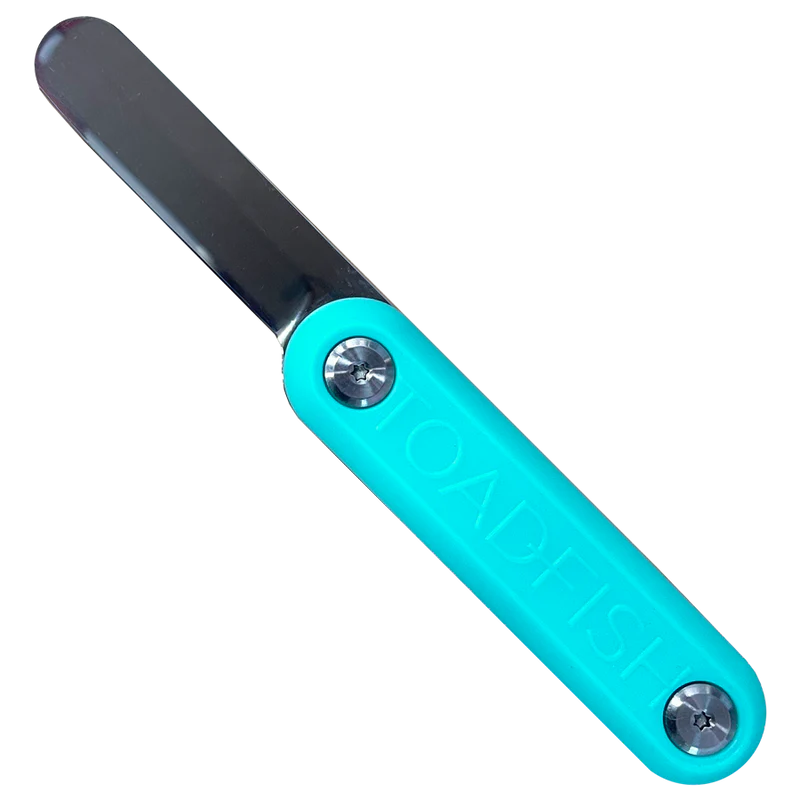 Turquoise putty knife with a metallic blade on a white background