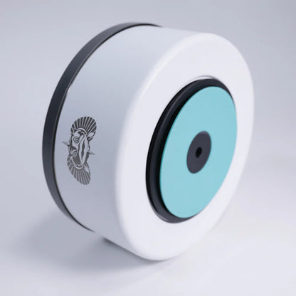 White cylindrical object with a blue circular component on a light gray background