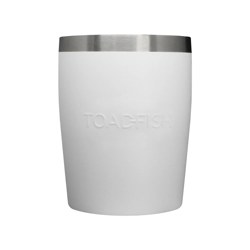 White tumbler with silver rim on a white background