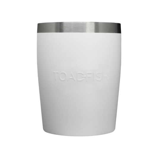 White tumbler with silver rim on a white background