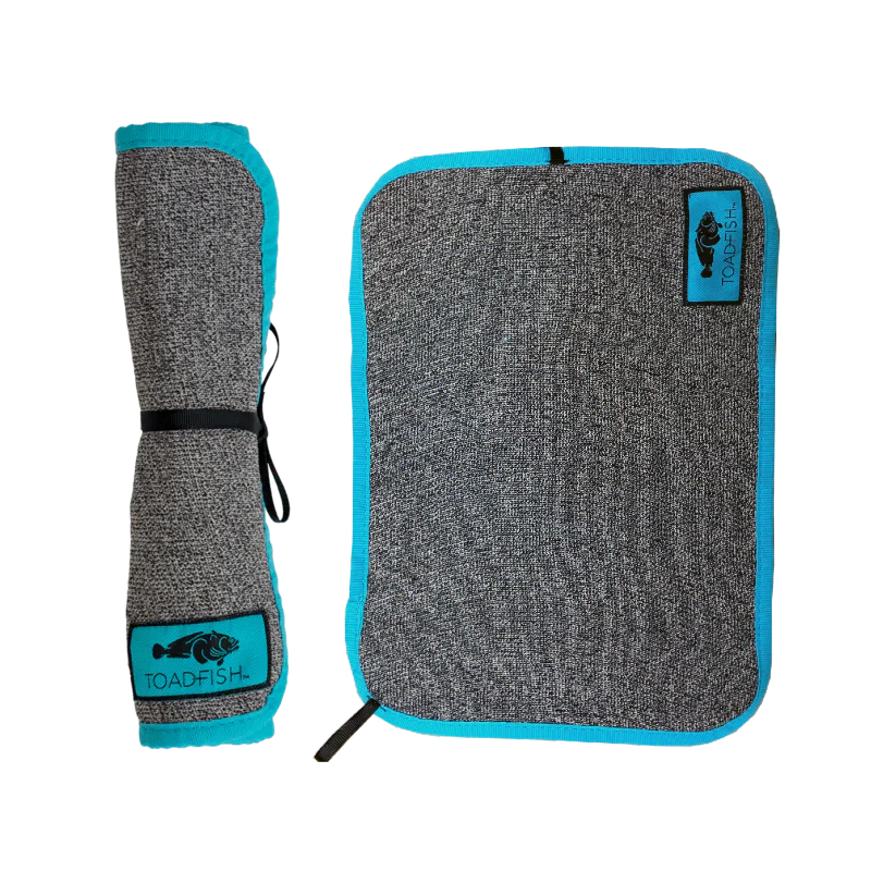 Gray and blue textured mat with a small logo on a white background