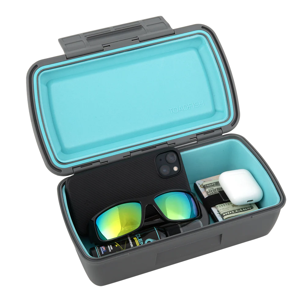 Open black and teal protective case with electronic items inside on a white background