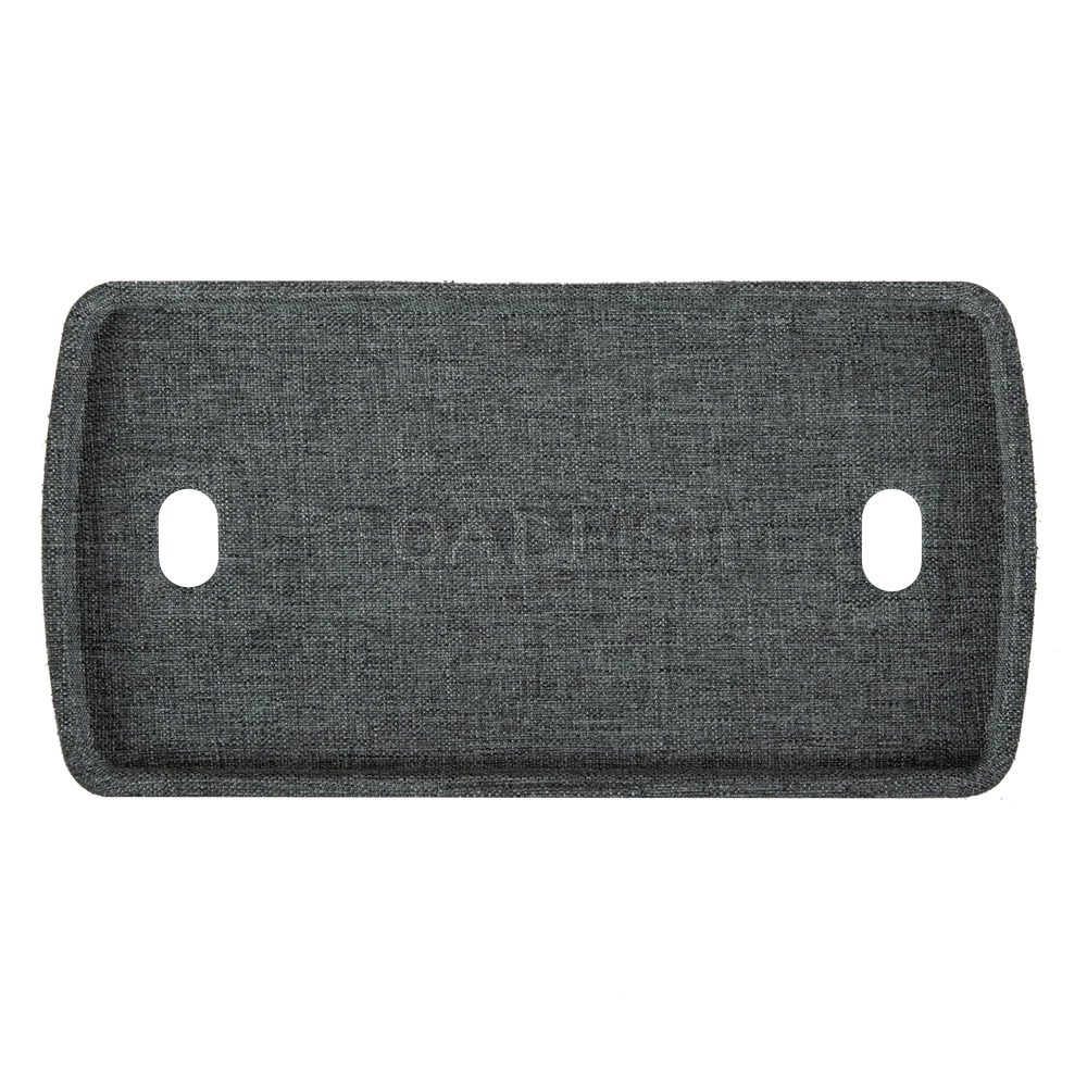 Gray textured mat with two circular holes on a white background