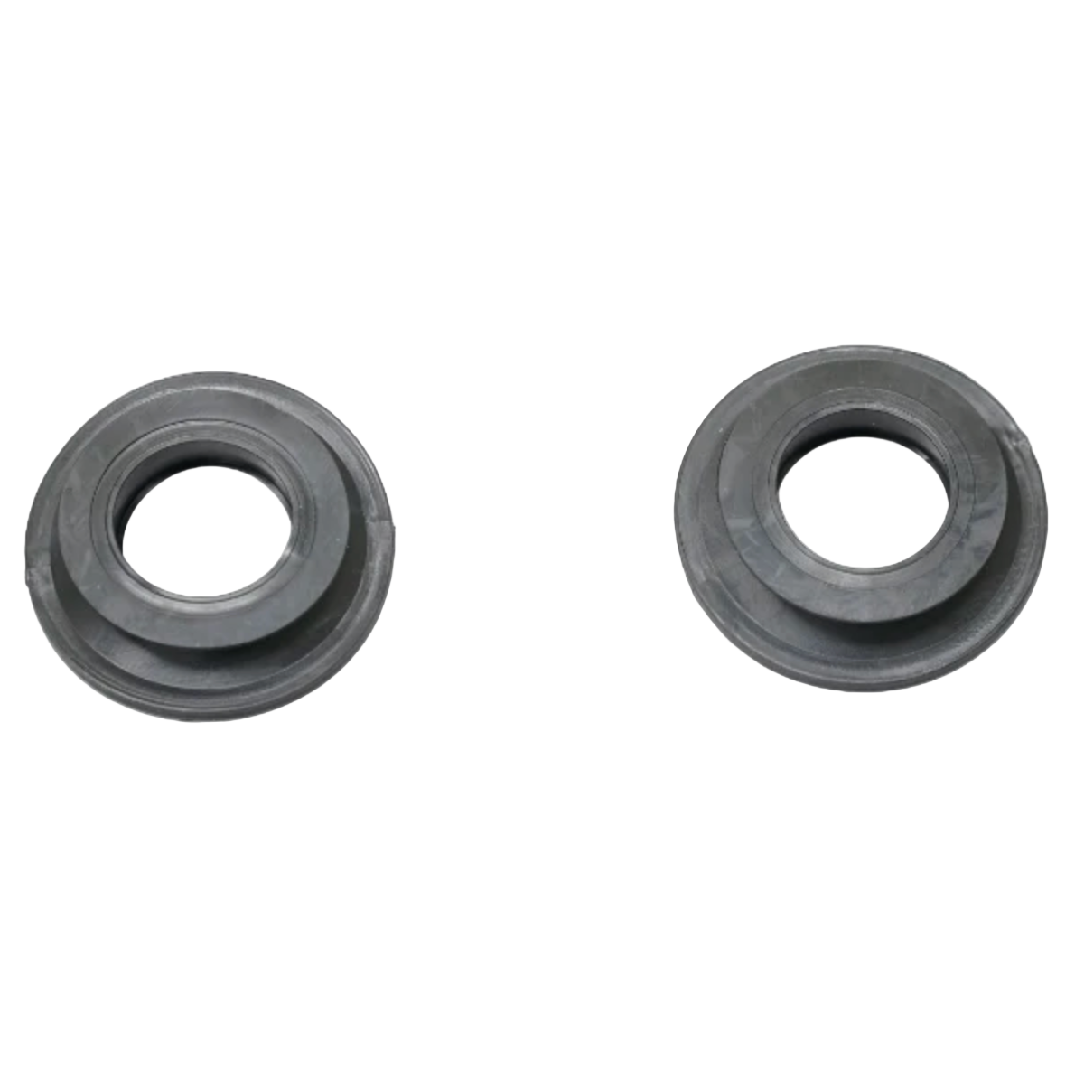 Two black rubber washers on a white background