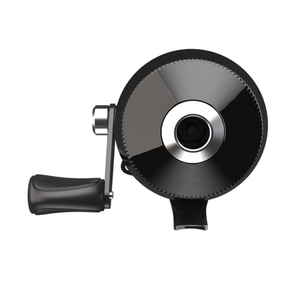 Black fishing reel with 'Zebco' branding on a white background